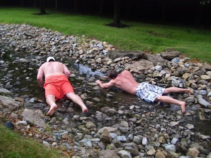 2 drunk asses swimming in a creek